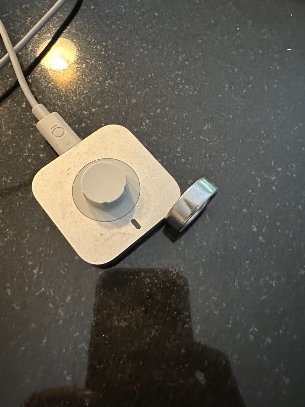 Oura Silver Charging Dock with silver ring